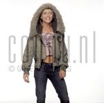 05-11-2002 Liesbeth Kamerling at studio in Amsterdam, by order of Televizier Magazine. November 05, 2002.

[keywords]Posed, Half Length, Laughing, Coat[/keywords]